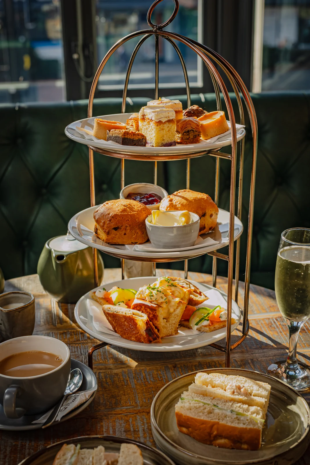 Afternoon tea with sandwiches, cakes and drinks at Residence