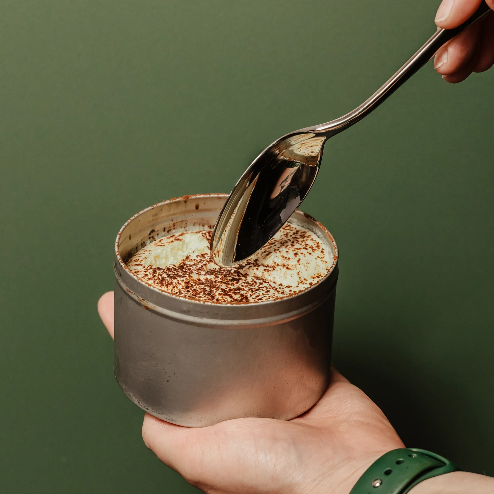A spoon scooping a dessert from a Wundercrumble pot